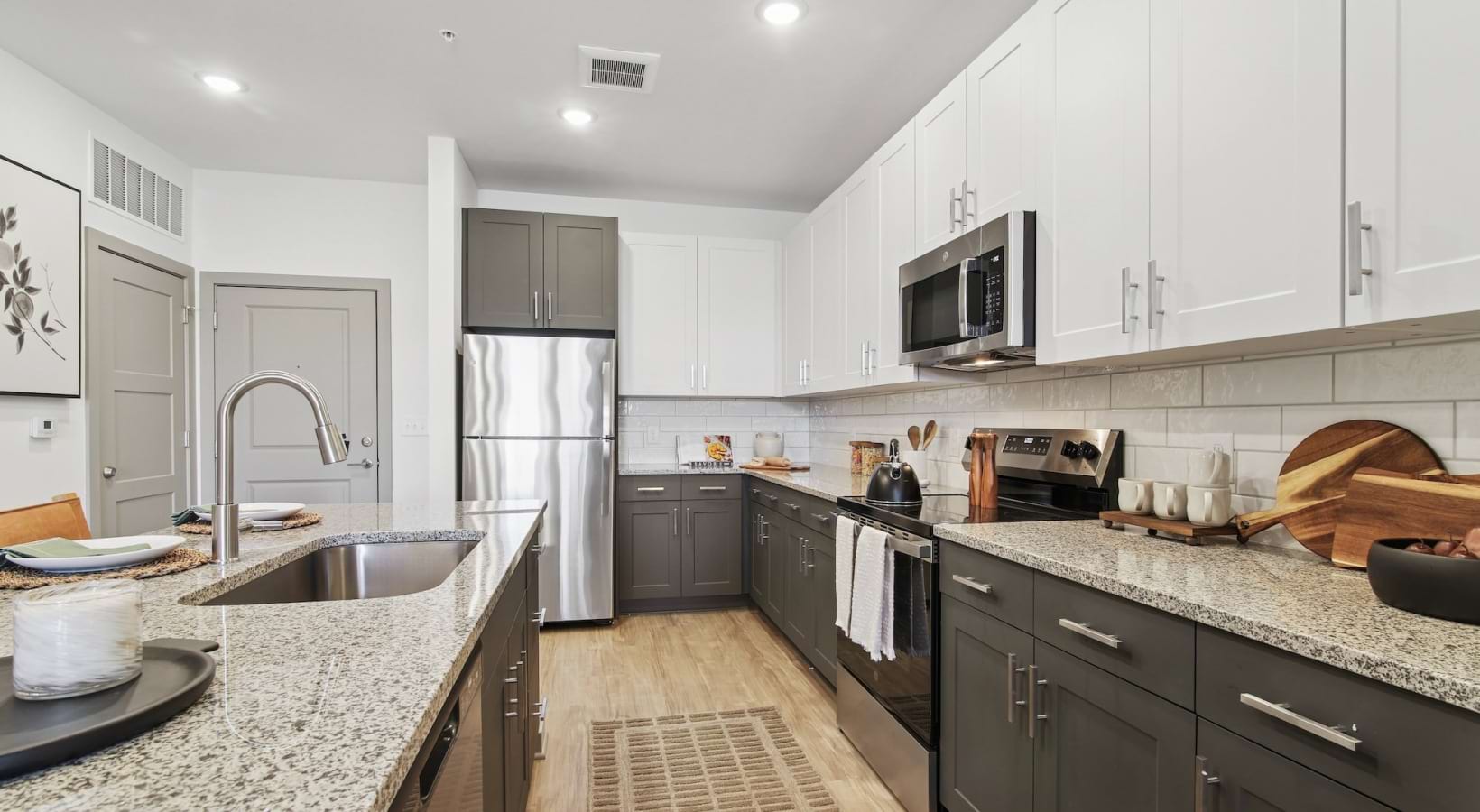 Accent Springs — kitchen with white shaker cabinets and granite countertops
