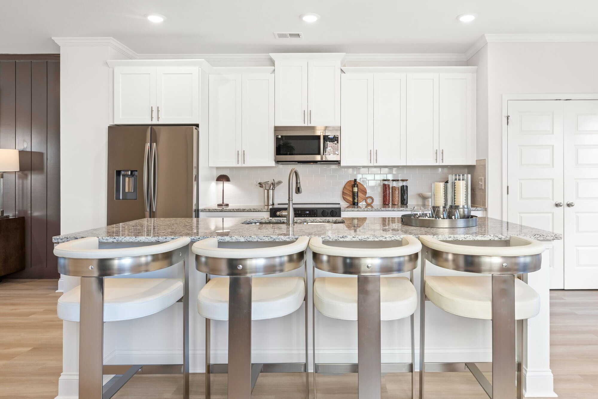 Enclave — galley kitchen with two-tone cabinetry